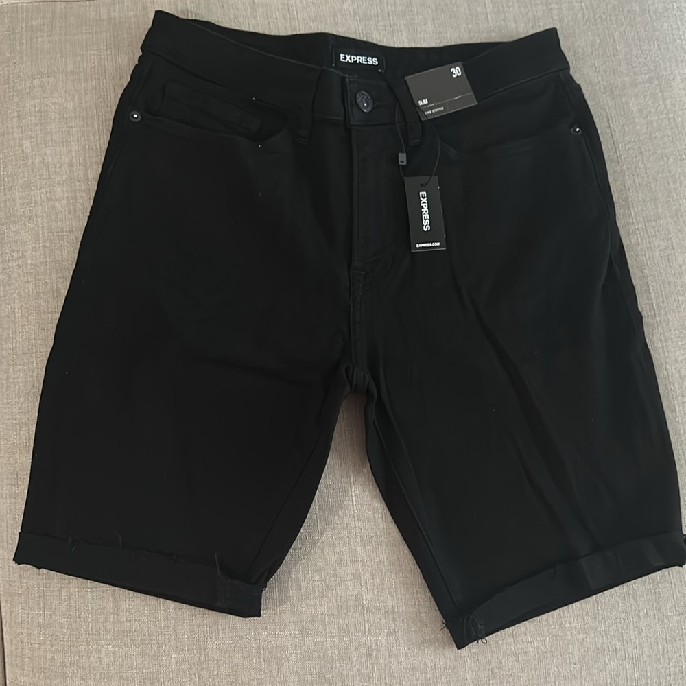 Black Cuffed Hem Hyper Stretch Jean Shorts
Size: SLIM 30
Color: Pitch Black